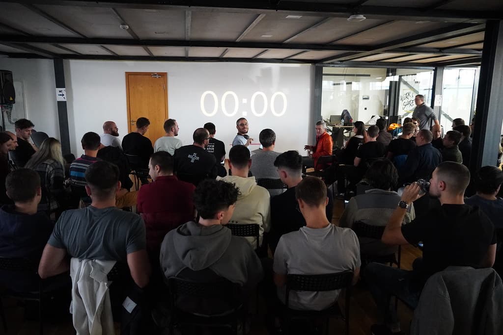 The hackathon hall with the countdown on screen